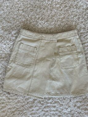 Beige Mini cream denim skirt with Front Patch Pockets